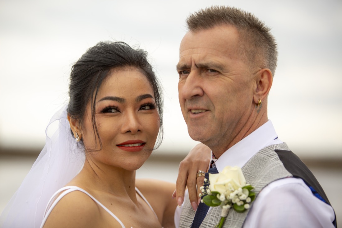 Suan and Tom's wedding photography by Confetti Chasers